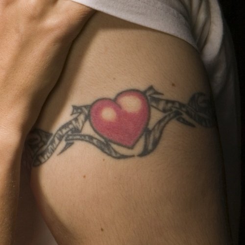 Man with Heart Tribal Tattoo