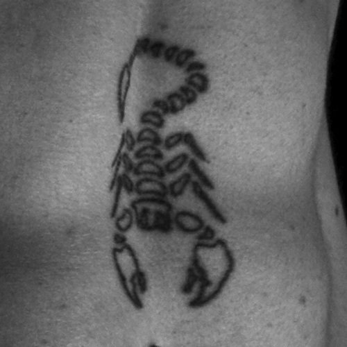 Man with Scorpio Tattoo