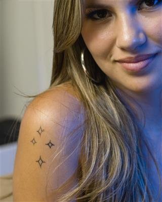 Smirking Hispanic Young Woman